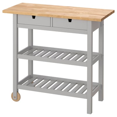 This image shows an ikea FÖRHÖJA kitchen trolley in light grey with a wooden top. It has two drawers, two shelves, and wheels for easy movement.