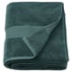 Option: Folded dark green FREDRIKSJÖN towel with woven border, 100% cotton.