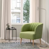 FULLÖSA green barrel chair, ergonomic & compact, with side table & lamp.