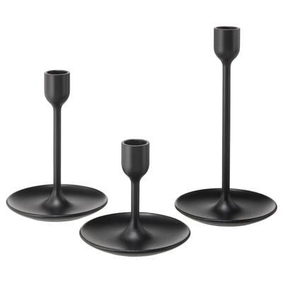 Three black modern candlesticks in varying heights, sleek aluminum design with felt pads for stability.