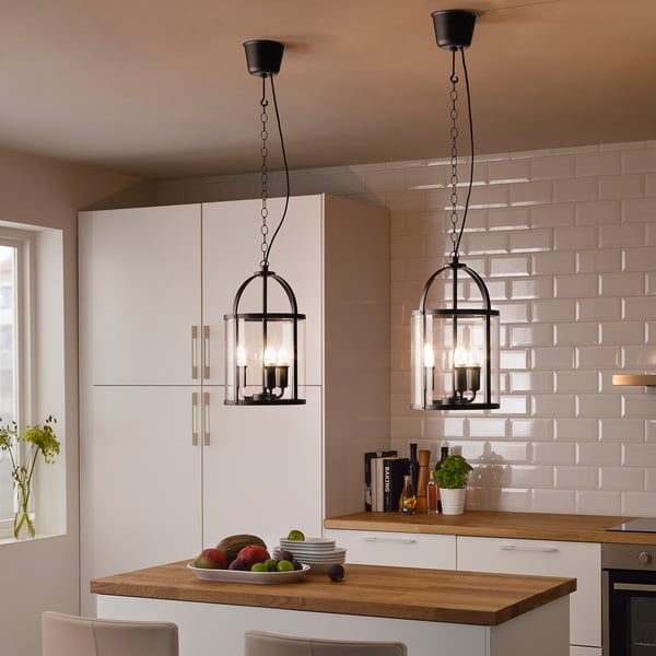 Two GALJON lamps above kitchen island, providing warm, stylish lighting.