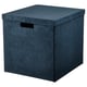 A dark blue GJÄTTA velvet storage box with a lid and handles, ideal for organizing and displaying items on shelves.
