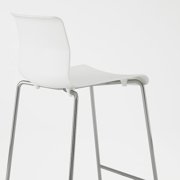 A sleek white stool with chrome legs and smooth seat, designed for stacking, against a clean white background.