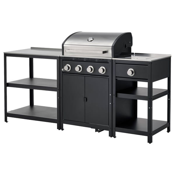 Modern outdoor kitchen setup with black metal shelves, a stainless steel gas grill, and a side burner.