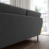 Dark grey GRILLSTORP sofa, sleek modern design, ample cushions. Comfortable, spacious, ideal for large rooms.