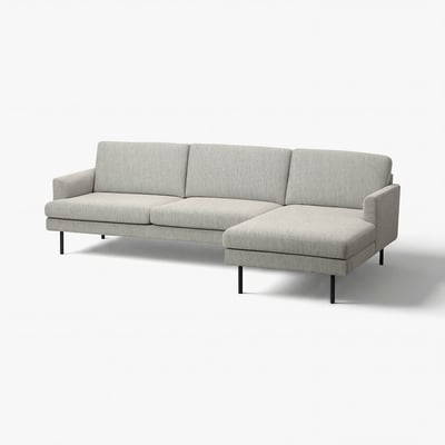 Modern light grey fabric sofa with chaise, smooth lines, and dark metal legs.