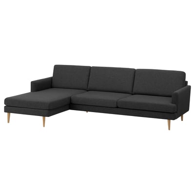Modern charcoal gray 4-seat l-shaped sofa with wooden legs, deep cushions, and sleek design.
