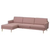 The GRILLSTORP sofa in light pink, with a modern design and comfortable cushions.