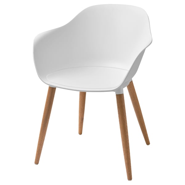 A white GRÖNSTA chair with curved shell seats, wooden legs, and armrests for comfort.