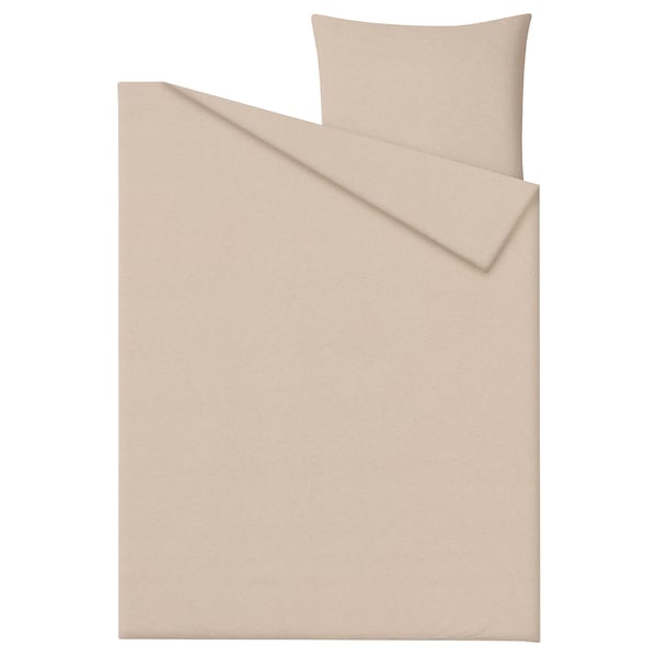 A light tan colored bedding set, featuring a duvet cover and pillowcase made from soft, 100% cotton flannel.