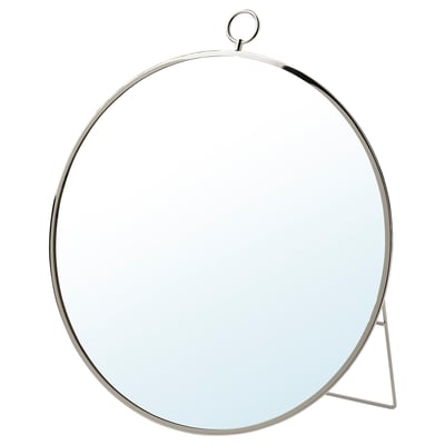A round, nickel-plated GRYTÅS mirror with a sleek, minimalist design. It can be hung or stood.
