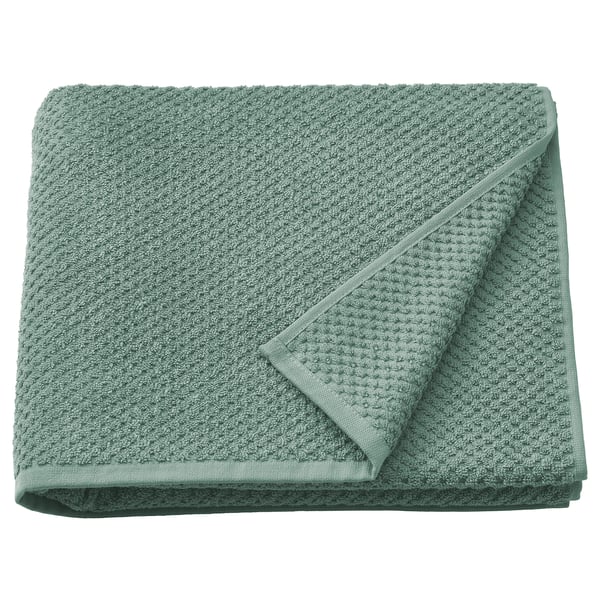 GULVIAL bath towel - sage green, folded, textured cotton.