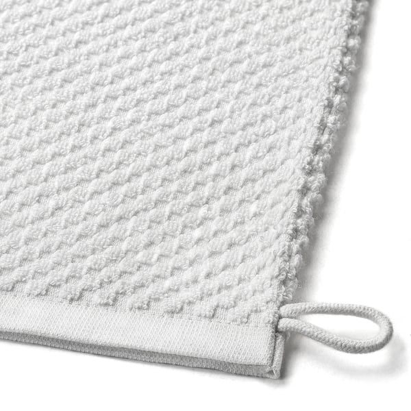 Terry cloth washing mitt with loop. Soft, absorbent cotton. Machine washable. Comfortable fit.