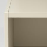 It shows a close-up of a modern white wooden bedside table with a metallic brown surface, highlighting its sleek design and quality materials.