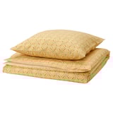 Yellow HAMNSENAP bedding set, patterned, with floral design both sides.