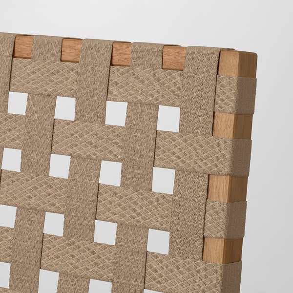 Interwoven beige outdoor chair with wooden frame, made of eucalyptus.