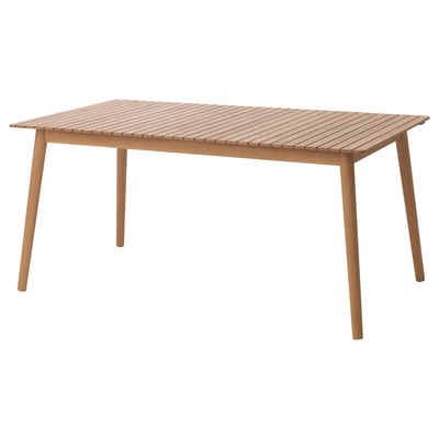 HATTHOLMEN outdoor table. Its brown with a rectangular shape, made of solid eucalyptus wood. It has four tapering legs and an acrylic stained finish.