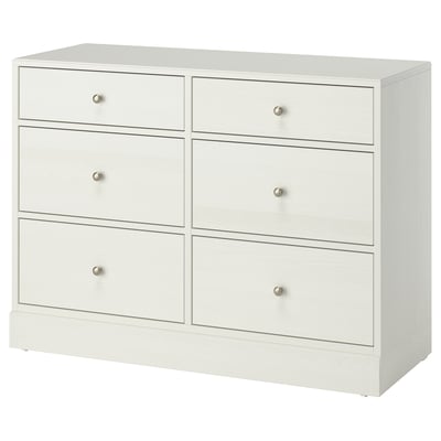A white HAVSTA chest of drawers with six drawers, made of solid pine and painted pine. It has a simple, clean design suitable for any room.