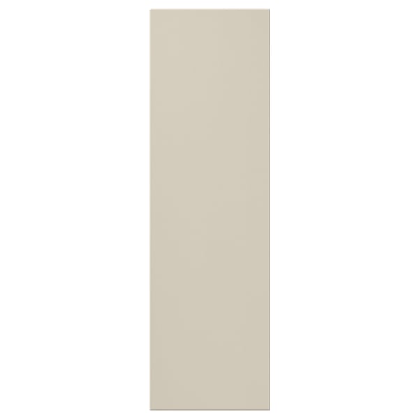 A beige HAVSTORP cabinet door with smooth, modern lines, made from acrylic paint and fiberboard.