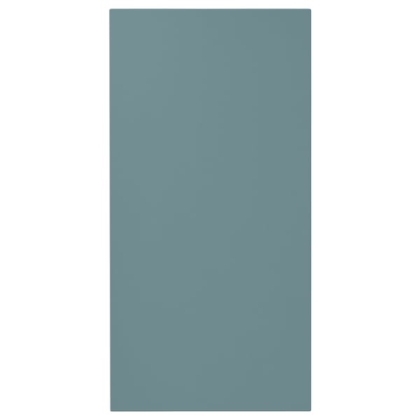 A turquoise HAVSTORP kitchen cabinet door, rectangular in shape, with a smooth lacquered finish.