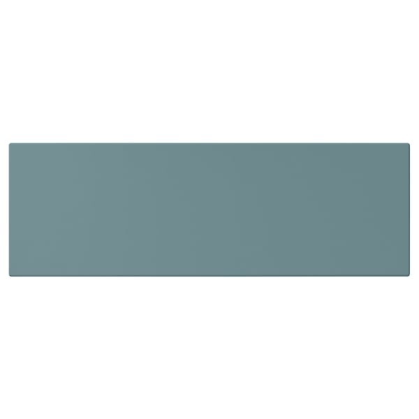 A turquoise HAVSTORP kitchen cabinet. Its rectangular, smooth, and lacquered for easy cleaning.