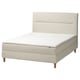 Modern, beige, upholstered bed with headboard and wooden legs.