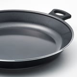 Black frying pan with non-stick coating and sturdy handle, showcasing its high-quality surface and design.
