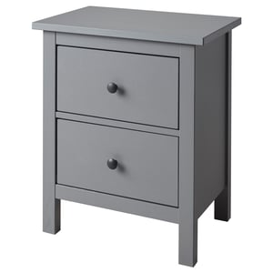 Gray HEMNES wooden nightstand with two drawers.