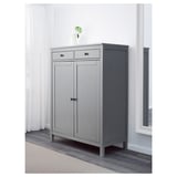 Gray wooden cabinet with two doors and drawers. Simple, classic design.