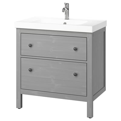 Modern grey wooden bathroom vanity with two drawers, white sink, chrome faucet, and clean lines.