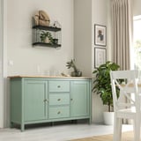 HEMNES green sideboard with vases, plants & chair.
