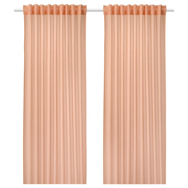 Two peach-colored sheer curtains hang side by side, featuring a simple, sleek design with rod pockets at the top.