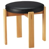 Holmsjo stool: round black cushion, light wood legs, classic design.