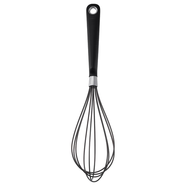 Black silicone ikea whisk with stainless steel wires and a comfortable grip handle for safe kitchen use.