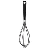 Black silicone ikea whisk with stainless steel wires and a comfortable grip handle for safe kitchen use.