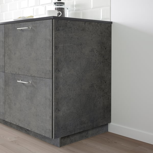 KALHYTTAN cabinet, black, stands tall against white tiled wall, fits in corner, largely unseen items on top.