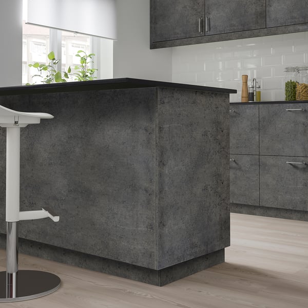 KALHYTTAN countertop: dark gray, large, rectangular, modern design, contrasts with white wall tiles.