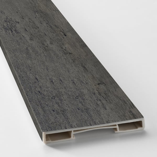 Dark gray kitchen plinth, angled view showing sleek, textured surface and durable edge design.