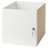 A white KALLAX cabinet insert with a lock and key. Its made of fibreglass and particleboard, rectangular in shape, designed for secure storage.