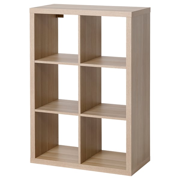 KALLAX shelving unit in light oak, grid design with multiple compartments.