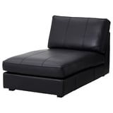 Black KIVIK chaise lounge. Modern design, leather upholstery, l-shaped.