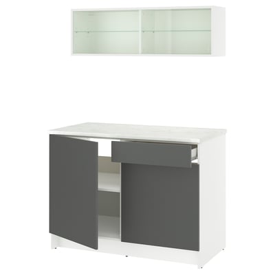 Modern white kitchen unit with gray doors and marble countertop. Includes wall cabinet with sliding glass doors.