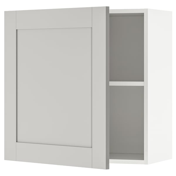 KNOXHULT modular white kitchen cabinet, rectangular, with single door and shelves.