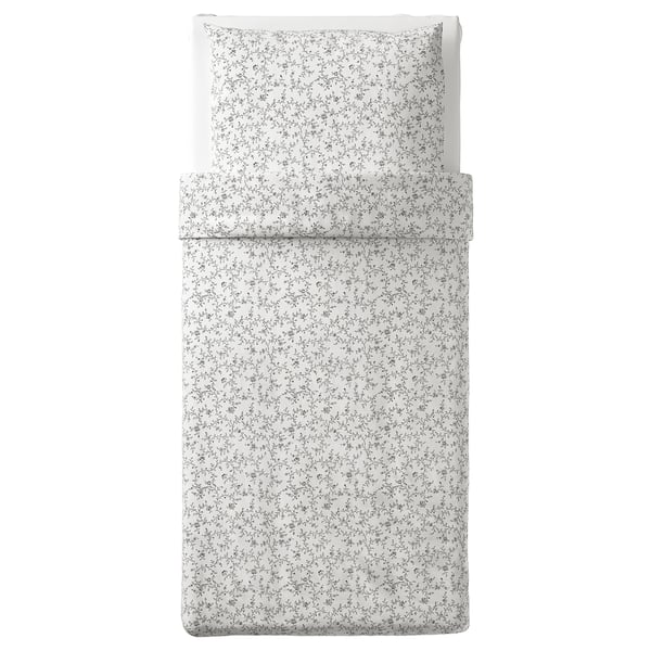 KOPPARRANKA white floral bedding set; a floral pattern, made of cotton and viscose blend, rectangular shape.