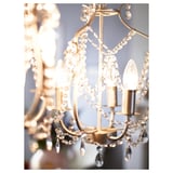 Elegant chandelier with sparkling crystals spreads soft light. Adjustable height, uses e14 bulbs.