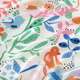 Vibrant pre-cut fabric playful birds, flowers, & leaves on white, perfect for crafting & sewing projects.