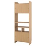 Light wood LÅDMAKARE storage unit. Tall, rectangular, open bottom shelves, top cabinet. Modern, minimalist design.