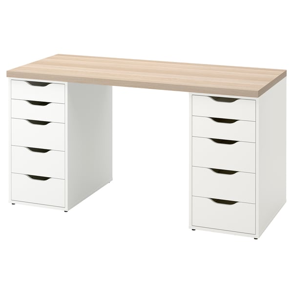 An ikea LAGKAPTEN desk with a light wood top and white drawers. Its rectangular, with two sets of five drawers on both sides for storage.