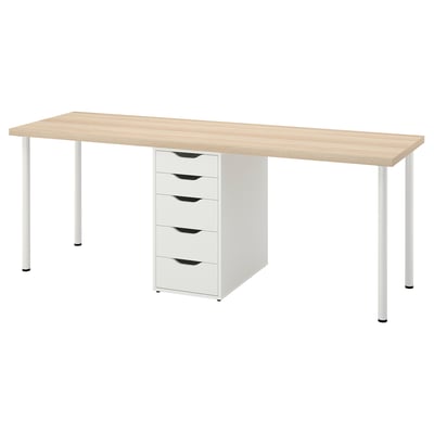 An LAGKAPTEN desk in white, with a light wood top and metal legs, including a five-drawer unit.