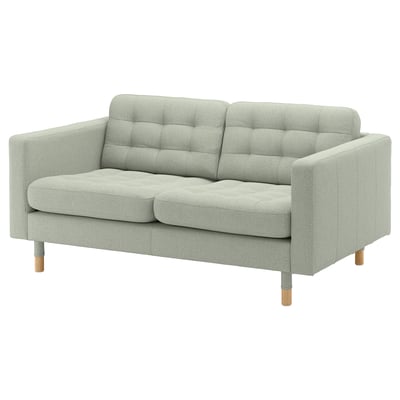 Light gray LANDSKRONA loveseat, tufted fabric, wooden legs, compact modern design.